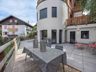 Discover a stunning property with modern architecture and a serene outdoor space.