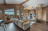 Experience luxury living in this stunning chalet, featuring exquisite wooden interiors and breathtaking mountain views.