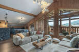 Experience luxury living in this stunning property, featuring a spacious living area with a modern design.