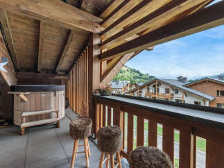 Enjoy breathtaking mountain views from this stunning balcony.