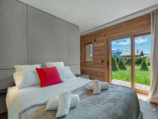 Experience luxury and tranquility in this stunning bedroom.