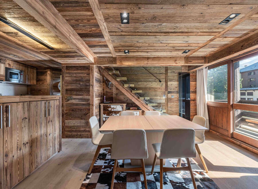 Experience rustic elegance in this stunning property, featuring exquisite wooden details throughout.