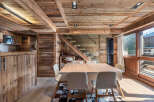 Experience rustic elegance in this stunning property, featuring exquisite wooden details throughout.