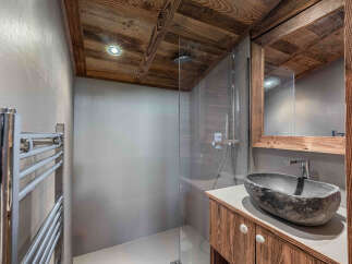 Experience rustic elegance in this stunning bathroom.