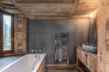 Experience rustic elegance in this stunning bathroom.