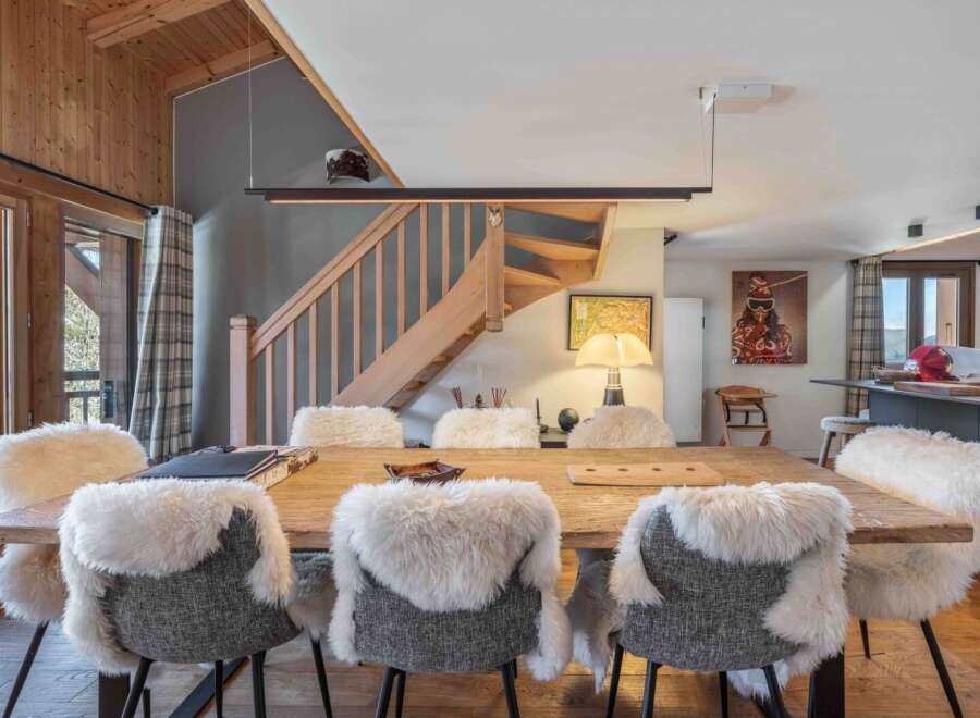 This stunning property boasts a spacious dining area, perfect for hosting gatherings.