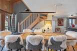 This stunning property boasts a spacious dining area, perfect for hosting gatherings.