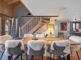 This stunning property boasts a spacious dining area, perfect for hosting gatherings.