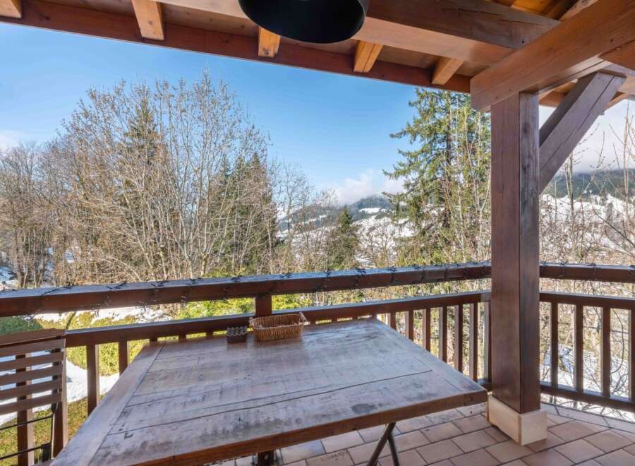 Enjoy breathtaking mountain views from this charming property.