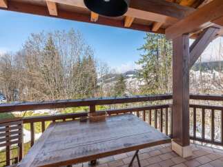 Enjoy breathtaking mountain views from this charming property.