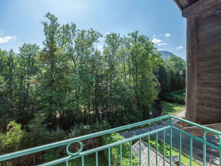 Enjoy breathtaking views from this charming property.