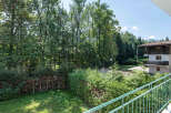 Enjoy breathtaking views from this charming property, surrounded by lush greenery and mature trees.