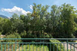 Enjoy breathtaking views from this property, featuring lush greenery and a serene atmosphere.