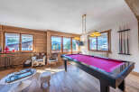 This stunning property boasts a luxurious game room, perfect for entertaining guests or enjoying a relaxing evening.
