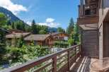 Enjoy breathtaking mountain views from this stunning chalet-style property.