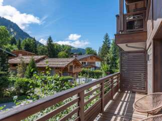 Enjoy breathtaking mountain views from this stunning chalet-style property.