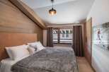Experience the ultimate in alpine luxury with this stunning bedroom.
