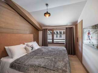 Experience the ultimate in alpine luxury with this stunning bedroom.