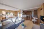 Experience luxury living in this stunning property, featuring a seamless blend of modern design and natural elements.