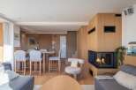 Experience luxury living in this stunning property featuring a cozy fireplace, perfect for chilly evenings.
