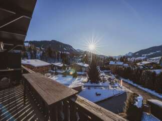 Enjoy breathtaking mountain views from this charming property.