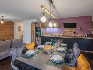 This stunning property boasts a modern open-plan living space, perfect for entertaining.