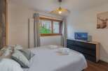 Experience the epitome of comfort in this inviting bedroom.