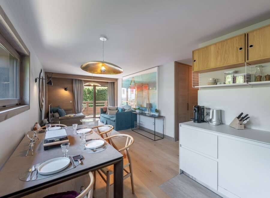Experience luxury living in this stunning property, featuring a beautifully designed dining area perfect for entertaining.