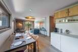 Experience luxury living in this stunning property, featuring a beautifully designed dining area perfect for entertaining.