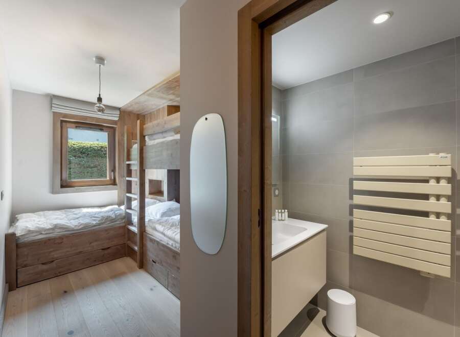 This stunning property boasts a modern design with a focus on natural materials.