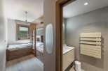 This stunning property boasts a modern design with a focus on natural materials.