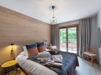Experience the epitome of comfort and style in this beautifully designed bedroom.