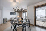 Experience luxury living in this stunning property, featuring a beautifully designed dining area perfect for entertaining.