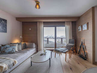 Experience the charm of this cozy living space, perfect for relaxation and entertainment.