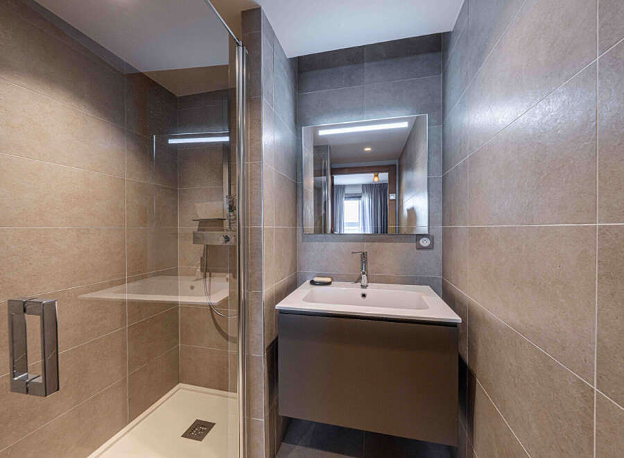 Step into modern elegance with this beautifully designed bathroom.