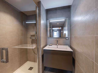 Step into modern elegance with this beautifully designed bathroom.