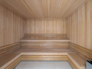 Step into relaxation with this stunning sauna, a perfect addition to any luxury home.
