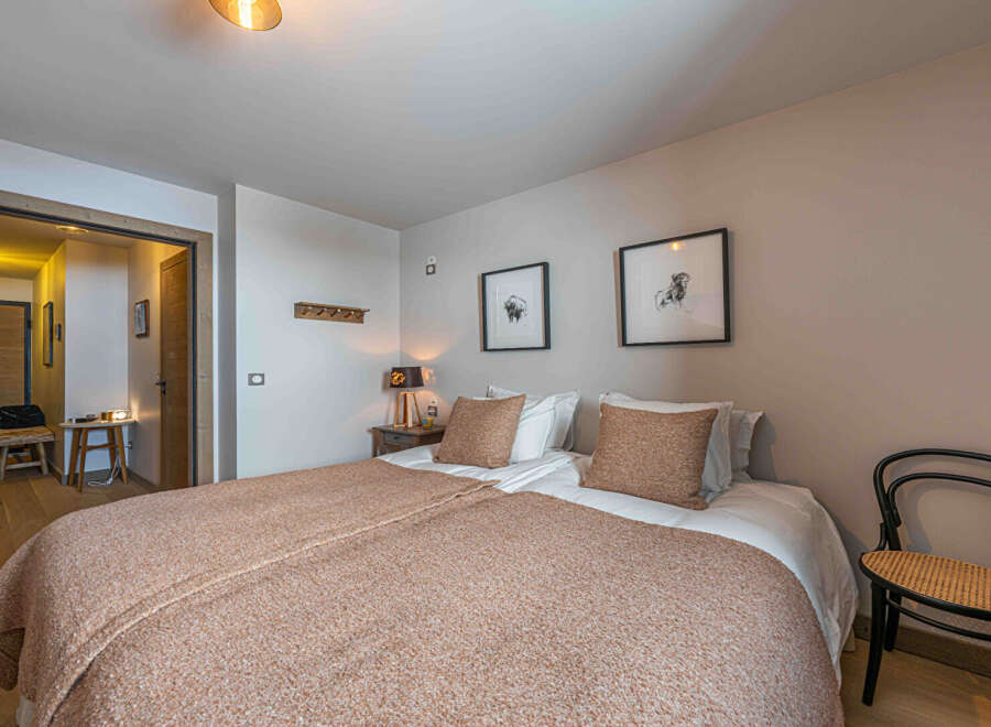 This cozy bedroom offers a warm and inviting atmosphere, perfect for relaxation.
