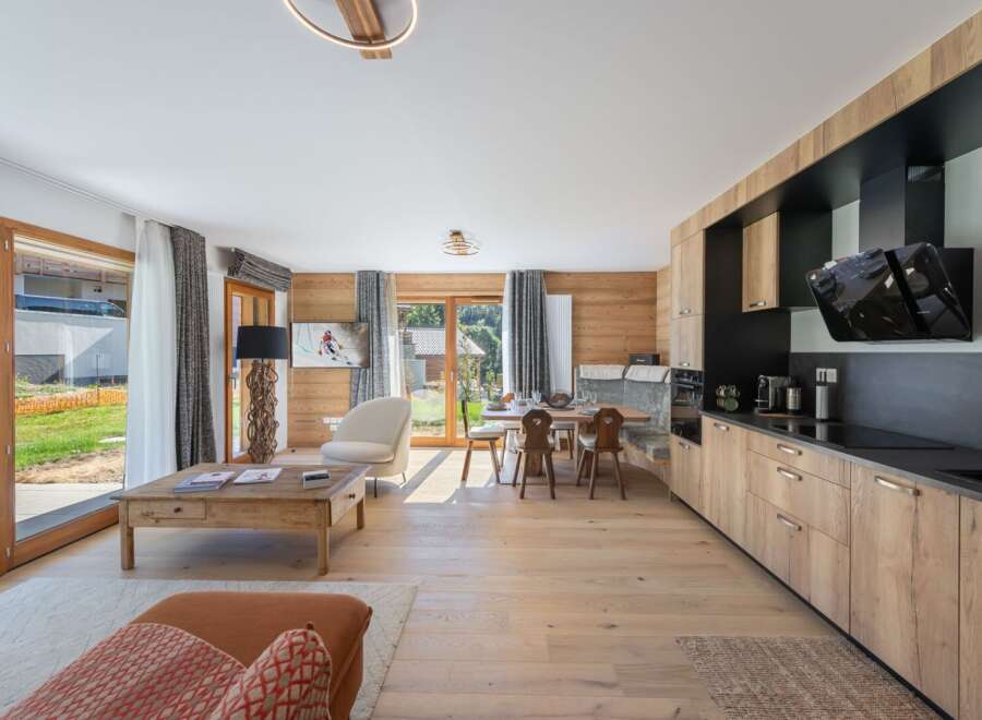 This stunning property boasts a modern kitchen with sleek appliances and ample storage, perfect for culinary enthusiasts.