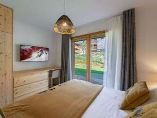 Experience the epitome of comfort and style in this beautifully designed bedroom.