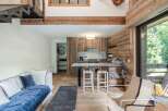 Discover the charm of this stunning property, featuring a beautifully designed interior with rustic wooden accents and modern amenities.