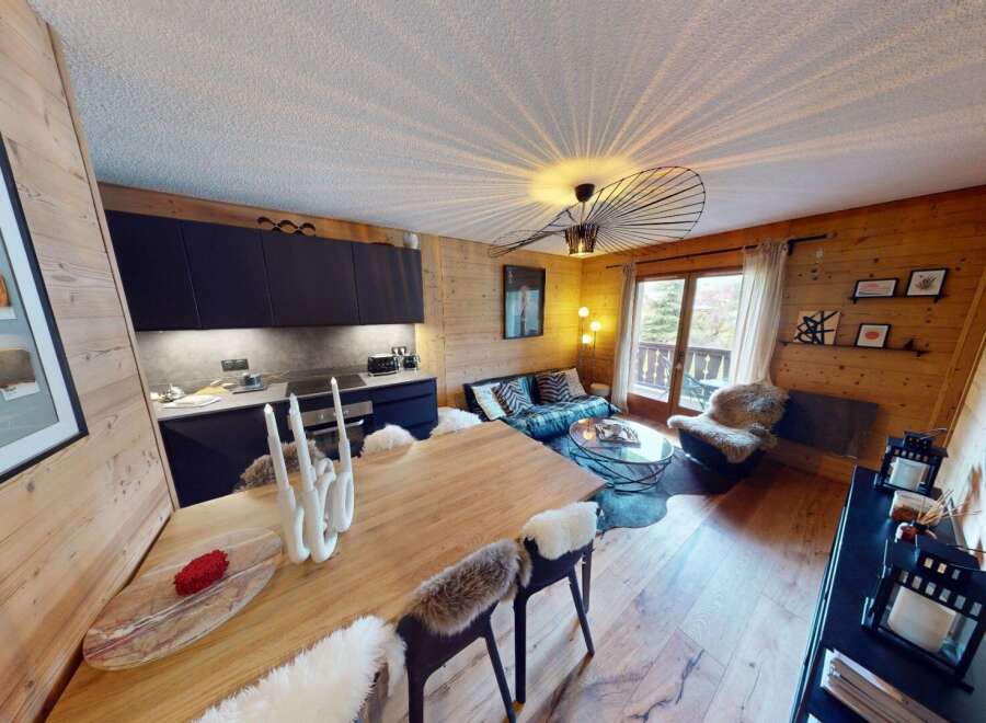 Discover the charm of this stunning property, featuring a modern kitchen and a cozy living area perfect for relaxation.