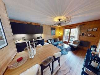 Discover the charm of this stunning property, featuring a modern kitchen and a cozy living area perfect for relaxation.