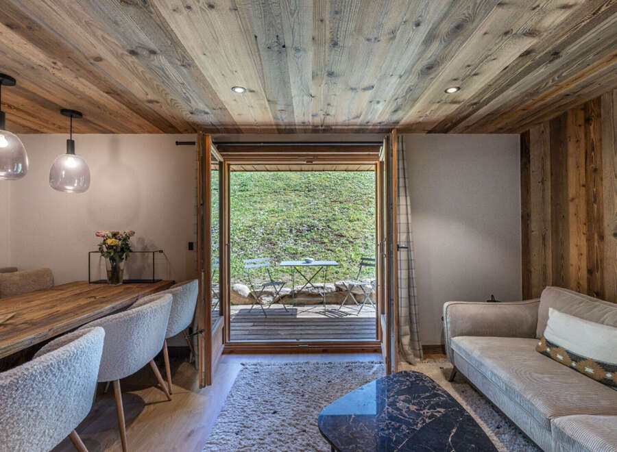 Step into a cozy retreat with this stunning property, featuring a seamless blend of rustic charm and modern comfort.