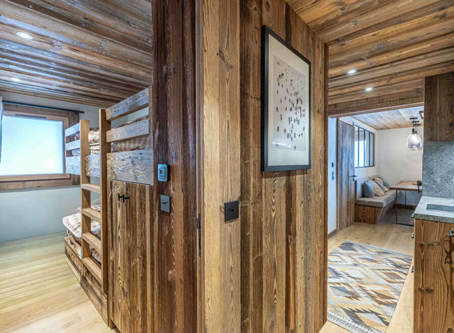 Step into rustic elegance with this stunning property, showcasing exquisite wooden paneling and a cozy, inviting atmosphere.