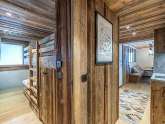 Step into rustic elegance with this stunning property, showcasing exquisite wooden paneling and a cozy, inviting atmosphere.