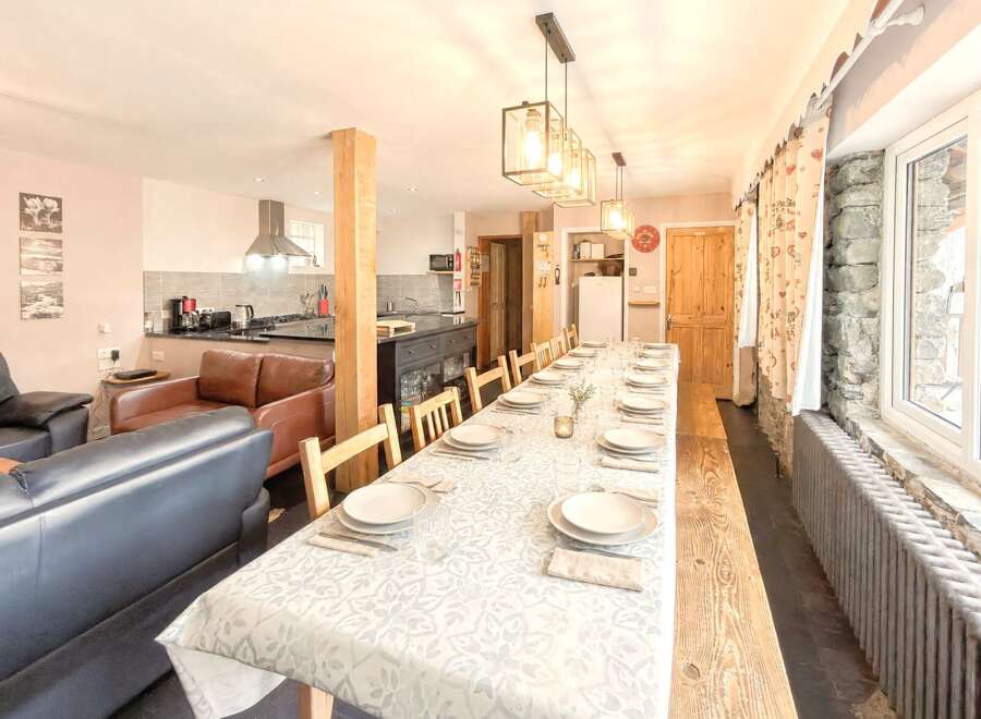This stunning property boasts a spacious dining area, perfect for hosting gatherings.