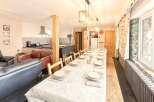 This stunning property boasts a spacious dining area, perfect for hosting gatherings.