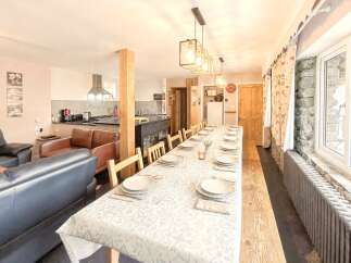 This stunning property boasts a spacious dining area, perfect for hosting gatherings.
