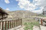 Discover breathtaking mountain views from this charming property.